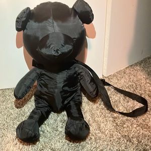 I am selling a medium sized teddy bear purse.